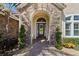 Stunning stone archway creates a grand entrance to this single Gathering home at 11502 Waterstone Loop Dr, Windermere, FL 34786