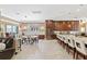 Spacious open-concept kitchen and dining area with modern appliances and ample counter space at 11502 Waterstone Loop Dr, Windermere, FL 34786