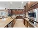 Spacious kitchen with granite countertops, stainless appliances, and lots of storage at 11502 Waterstone Loop Dr, Windermere, FL 34786