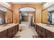 Luxury main bathroom featuring double sinks, a soaking tub, and a separate shower at 11502 Waterstone Loop Dr, Windermere, FL 34786