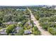 Aerial view of a home on a tree lined street, not far from area lakes and downtown at 1202 Chichester St, Orlando, FL 32803
