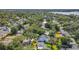 Aerial view of a home in a residential neighborhood, close to a nearby lake at 1202 Chichester St, Orlando, FL 32803
