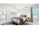 Bedroom with modern decor, natural light, and ensuite bathroom access at 1202 Chichester St, Orlando, FL 32803