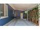 Carport with a concrete floor, storage space and landscaping at 1202 Chichester St, Orlando, FL 32803