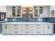 Elegant kitchen features white countertops, custom cabinets, and a unique backsplash design at 1202 Chichester St, Orlando, FL 32803