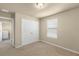 Cozy bedroom featuring a closet and a view from the window at 16043 Pebble Bluff Loop, Winter Garden, FL 34787