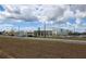 Modern community building with ample parking and well-maintained landscaping. Shows pedestrian-friendly design at 16043 Pebble Bluff Loop, Winter Garden, FL 34787