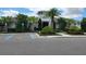 Attractive community clubhouse with landscaping and convenient parking access at 16043 Pebble Bluff Loop, Winter Garden, FL 34787