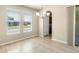 Dining room featuring tile flooring, a chandelier, and natural light from the windows at 16043 Pebble Bluff Loop, Winter Garden, FL 34787
