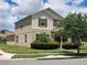Exterior view showcasing the home's architectural style and surrounding landscaping at 16043 Pebble Bluff Loop, Winter Garden, FL 34787