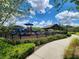 Community playground with slides and jungle gym for to enjoy for neighborhood children at 16043 Pebble Bluff Loop, Winter Garden, FL 34787