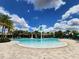 Kid friendly splash pool with zero entry and fountains at 16043 Pebble Bluff Loop, Winter Garden, FL 34787