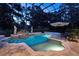 Inviting private pool with screened enclosure, water feature, and relaxing outdoor space at 1716 Greystone Ct, Longwood, FL 32779