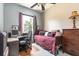 Bright bedroom featuring desk, bed, and dresser at 1718 Elaine Ave, Altamonte Springs, FL 32701