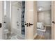 Bathroom featuring a tub and shower, and access to a bedroom at 1909 Donahue Dr, Ocoee, FL 34761
