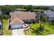 Aerial view of the home and the landscaping in the front yard at 1949 Tiptree Cir, Orlando, FL 32837
