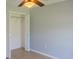 This bedroom offers a closet for storage, complemented by neutral walls, tile floors, and overhead lighting at 1949 Tiptree Cir, Orlando, FL 32837