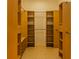 Spacious walk-in closet with custom shelving and ample storage space at 1949 Tiptree Cir, Orlando, FL 32837