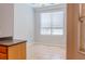 Bright dining area with tile flooring and large window that overlooks the backyard at 1949 Tiptree Cir, Orlando, FL 32837