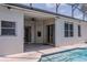 Pool steps leading into the pool, with access to the house through sliding glass doors at 1949 Tiptree Cir, Orlando, FL 32837