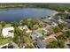 Scenic aerial view of lakefront properties with private docks and lush greenery at 195 E Faith Ter, Maitland, FL 32751