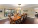 Well lit dining room with view of a covered patio and backyard at 195 E Faith Ter, Maitland, FL 32751