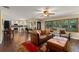 Spacious living room showcasing hardwood floors with views to kitchen at 195 E Faith Ter, Maitland, FL 32751