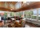 Inviting living room boasting wood ceiling, ample windows, and comfortable seating at 195 E Faith Ter, Maitland, FL 32751