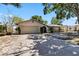 Attractive single-Gathering home boasting a well-kept lawn and a spacious two-car garage at 2007 Peach Tree Blvd, St Cloud, FL 34769