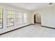 Sunlit living room showcasing tile flooring, neutral walls, and large windows at 2007 Peach Tree Blvd, St Cloud, FL 34769