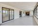 Spacious sunroom featuring sliding glass doors and large windows providing plenty of natural light at 2007 Peach Tree Blvd, St Cloud, FL 34769