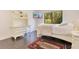 Bedroom with a white bed, a desk and dark laminate floors at 2108 Silver Leaf Ct, Longwood, FL 32779