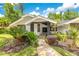 Charming one-story house with manicured landscaping and a welcoming entrance at 2108 Silver Leaf Ct, Longwood, FL 32779