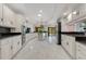Large kitchen with stainless appliances, granite counters, lots of cabinets, and marble floors at 2108 Silver Leaf Ct, Longwood, FL 32779