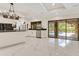 Bright kitchen with an island, stainless steel dishwasher, and seamless access to outdoor pool at 2108 Silver Leaf Ct, Longwood, FL 32779
