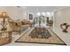 Elegant living room with a decorative rug, modern furniture, and lots of natural light at 2108 Silver Leaf Ct, Longwood, FL 32779
