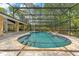 Inviting screened-in pool with stone surround, perfect for relaxing and entertaining guests at 2108 Silver Leaf Ct, Longwood, FL 32779