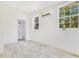 Bright room featuring tiled floors, modern air conditioning, and natural light. Great for guest room or office at 2108 Silver Leaf Ct, Longwood, FL 32779