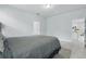 This bedroom features tile floors, neutral walls and is brightly lit with recessed lighting at 2618 Sidney Ave, Orlando, FL 32810