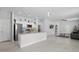 Modern open kitchen with granite countertops, stainless steel appliances, and seamless flow to living spaces at 2618 Sidney Ave, Orlando, FL 32810