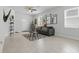 Cozy living room with tile flooring, ample natural light, and an open layout perfect for relaxation at 2618 Sidney Ave, Orlando, FL 32810