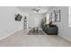 Inviting living room with tile flooring, contemporary furnishings, and an open layout for entertaining at 2618 Sidney Ave, Orlando, FL 32810