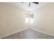Clean bedroom with neutral paint, trim, and tile flooring at 2711 Parkland Dr, Winter Park, FL 32789