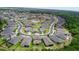 Aerial view of a residential neighborhood, showcasing the community and surrounding greenery at 274 Brunswick Dr, Davenport, FL 33837