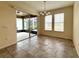 Dining area with sliding glass doors leading to a screened lanai at 274 Brunswick Dr, Davenport, FL 33837