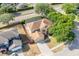 Suburban house showing driveway, two car garage, lawn, and screened in pool at 2780 Running Springs Loop, Oviedo, FL 32765