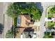An aerial view of a single-Gathering home featuring a private pool and mature landscaping at 2780 Running Springs Loop, Oviedo, FL 32765