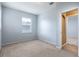 Well-lit bedroom with walk-in closet, carpeted floor, and window at 2780 Running Springs Loop, Oviedo, FL 32765