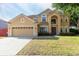 Charming two-story home featuring a two-car garage and well-maintained lawn in a desirable neighborhood at 2780 Running Springs Loop, Oviedo, FL 32765