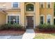 Elegant front entrance showcasing a beautiful door with sidelights and manicured landscaping at 2780 Running Springs Loop, Oviedo, FL 32765